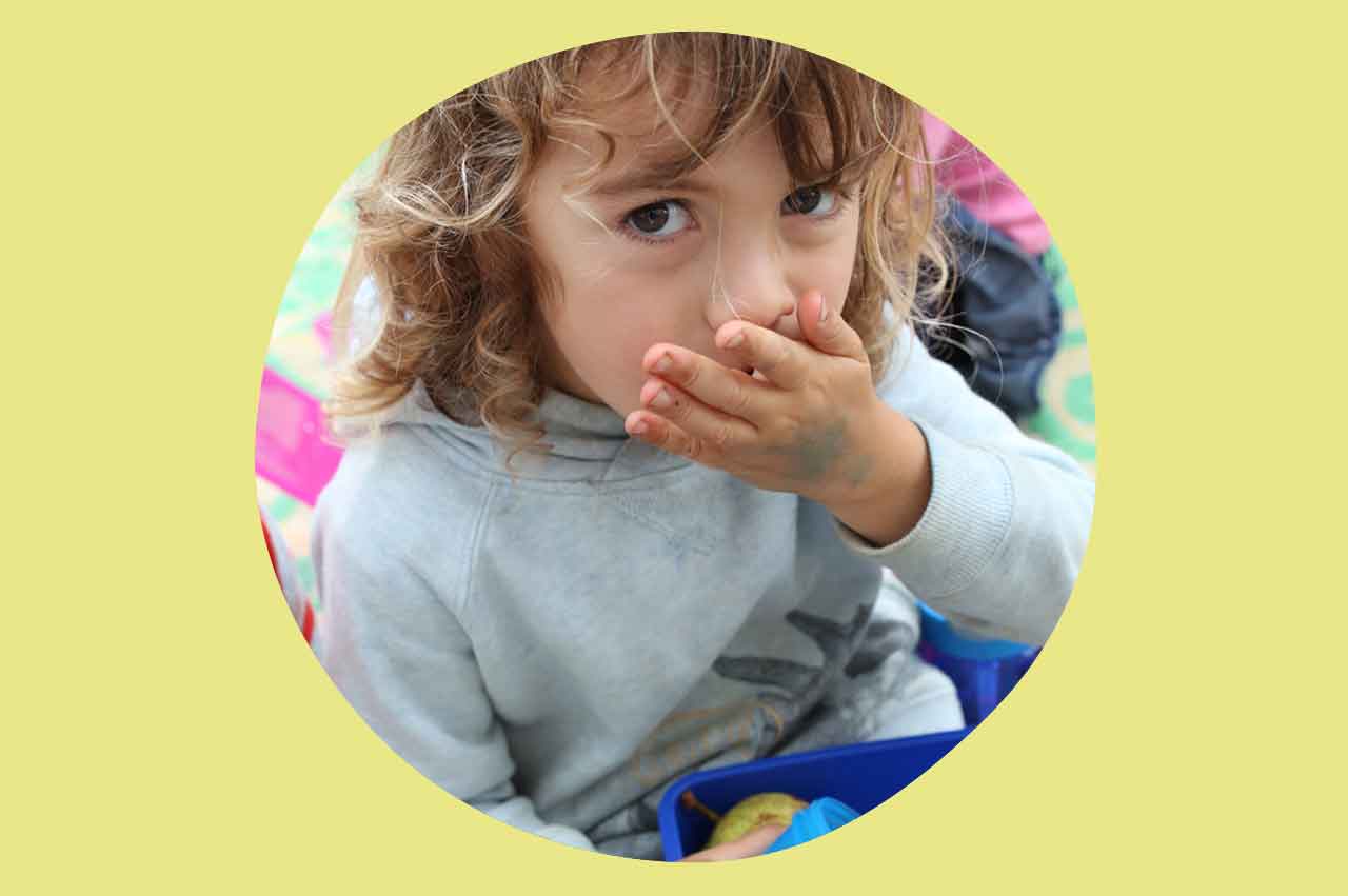 Boy enjoys a healthy snack for lunch