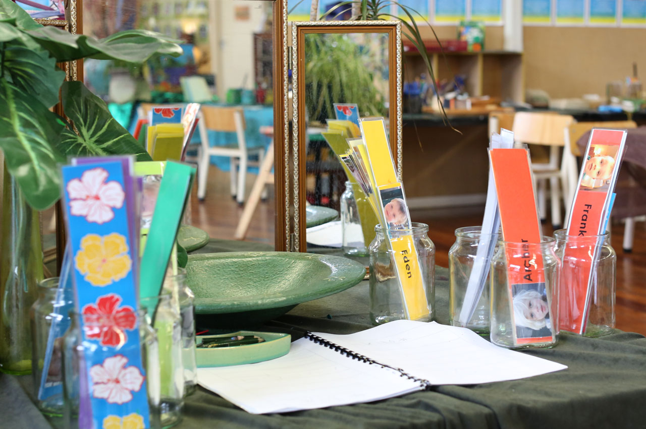 Children's special 'sign in' area where children can practise writing their name