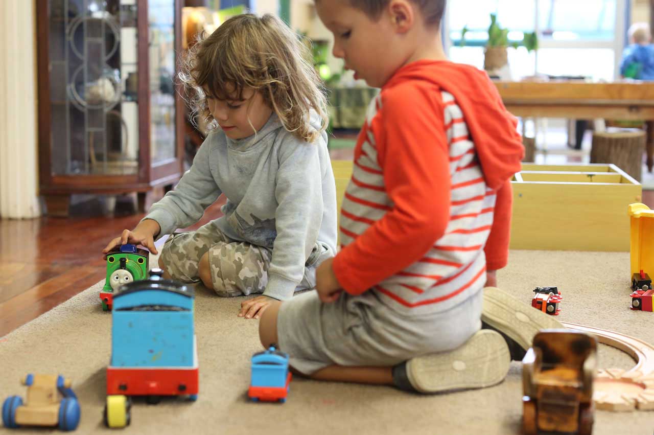 Boys share some of the trains together